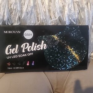 Black Gel Polish with Blue and Gold Accents